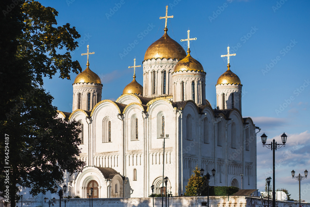 Medieval architecture with gold domes and crosses on top in a citys skyline