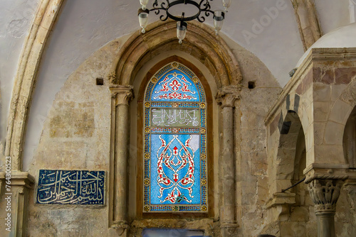 Aqua blue stained glass window in the Cenacle, or upper room of King David's Tomb, said to be the location of the Biblical Last Supper, in Jerusalem Israel. 