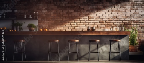 A setting featuring a bar area with tall seats and a backdrop of a rustic brick wall
