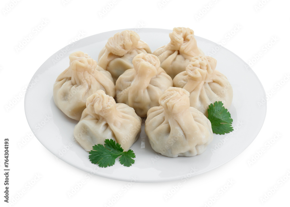 Plate with many tasty khinkali (dumplings) and parsley isolated on white. Georgian cuisine Plate with many tasty khinkali (dumplings) and parsley isolated on white. Georgian cuisine