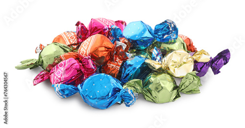 Quadro su tela Pile of sweet candies in colorful wrappers on white background