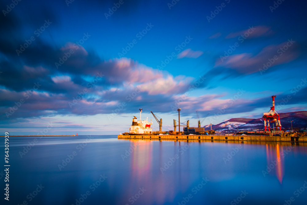 Obraz premium Otaru, Japan - March 28 2016: Otaru harbor in light of sunset