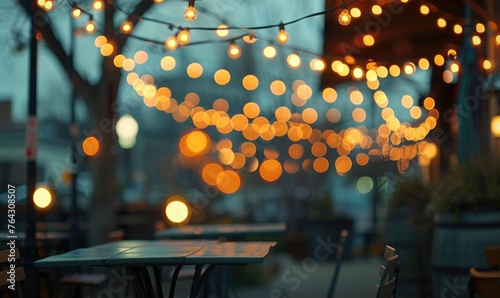 Soft bokeh lights creating a romantic ambiance in an intimate outdoor setting