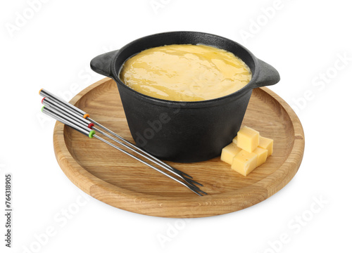 Fototapeta Naklejka Na Ścianę i Meble -  Fondue with tasty melted cheese, forks and pieces isolated on white