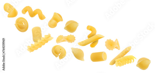 Different types of pasta flying on white background