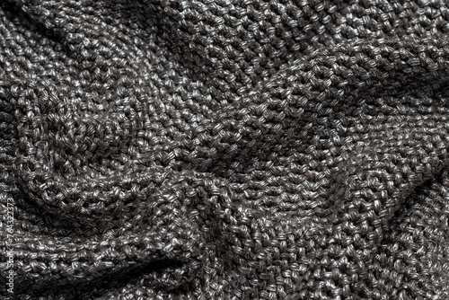 Wrinkled silver fabric that looks like chainmail photo