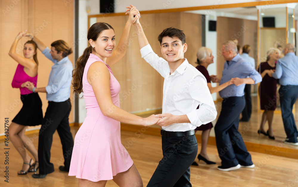 girl paired with boy at lesson for lovers of ballroom dancing rumba dance