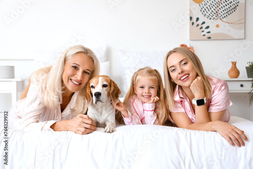 Happy family with cute dog ...