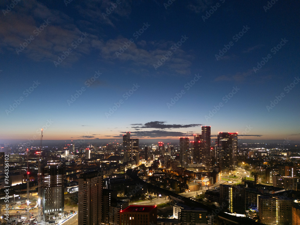 Obraz premium Sunrise over the Deansgate Square and Castlefield Basin, Manchester, UK 