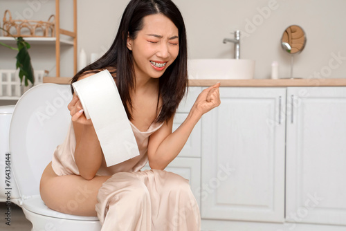 Young Asian woman with hemo...