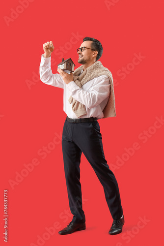 Portrait of male real estat...