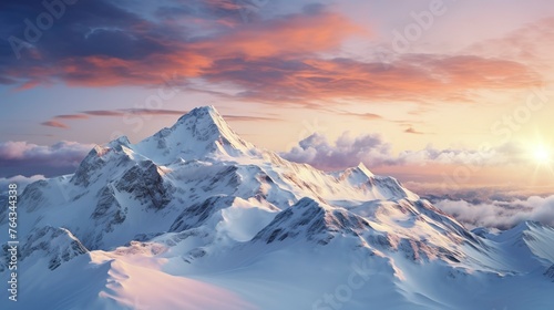 A photo of a snow-covered mountain ridge at dawn.