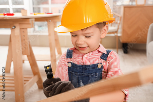 Cute little builder hammeri...