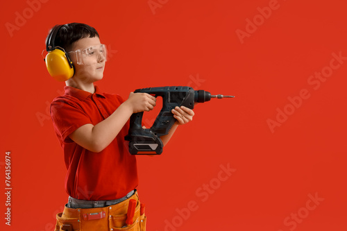 Cute little builder with dr...