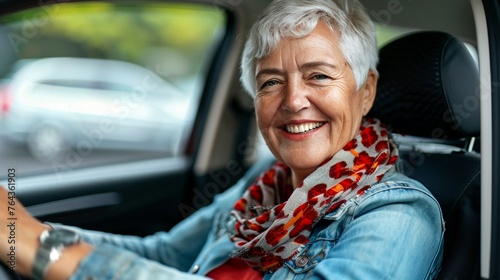 Joyful Car Ownership: Smiling Mature Woman Enjoying New Ride