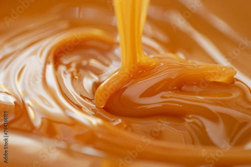 smooth texture of liquid melted caramel cream, poured onto the surface