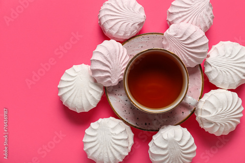 Cup of tea with white and p...