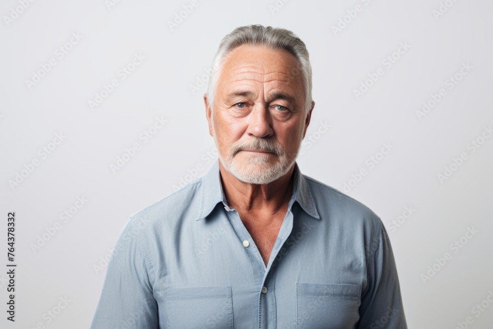 Portrait of senior man with grey beard. Isolated on white background. Portrait of senior man with grey beard. Isolated on white background.