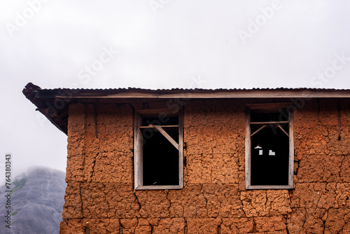 Window and roof of A tradional mud home in Ekiti, West of Nigeria on August 16, 2023.