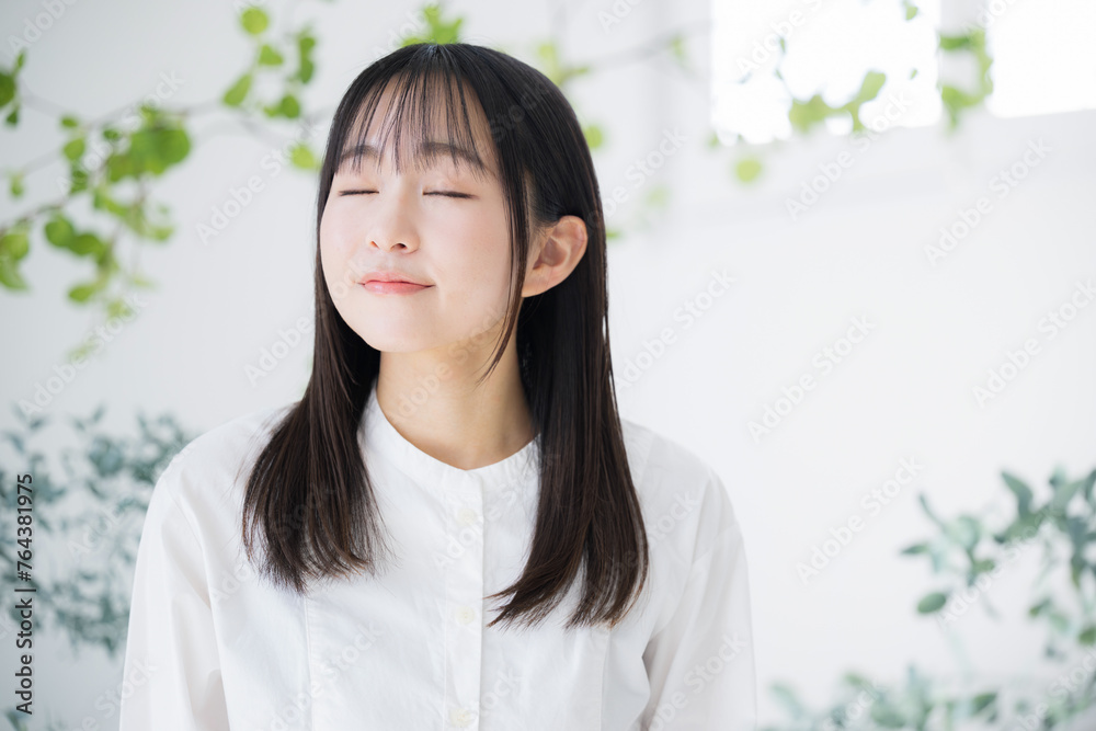 Young Asian (Japanese) woman in her 20s beauty beauty beauty image looking forward eyes closed Young Asian (Japanese) woman in her 20s beauty beauty beauty image looking forward eyes closed