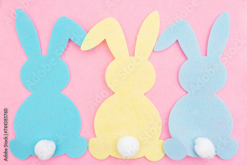 Easter bunny rabbit background on pink felt