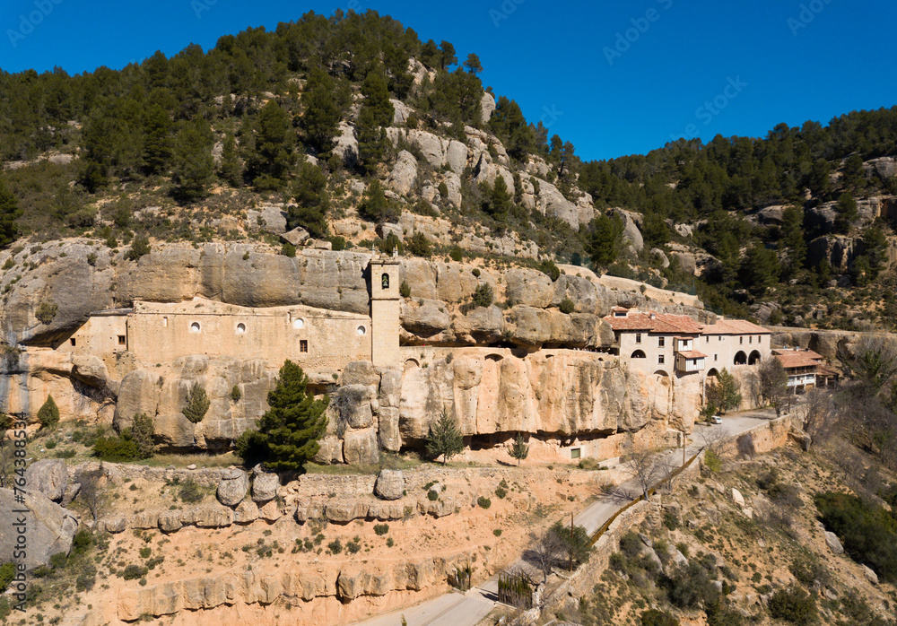 Sanctuary of Virgin of Balma in natural grotto in mountain next to Spanish village of Sorita