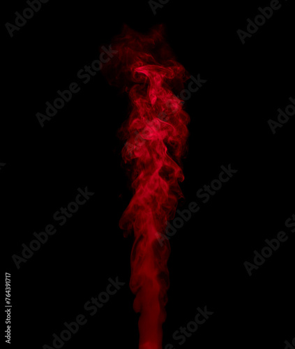 Abstract background of chaotically mixing puffs of red smoke on a dark background