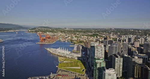 Vancouver BC Canada Aerial v35 drone flyover the harbour capturing landmark Canada place, waterfront downtown cityscape and Eastside Centerm container terminal - Shot with Mavic 3 Pro Cine - July 2023 photo