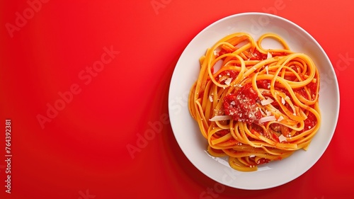 A sumptuous plate of spaghetti with tomato sauce and cheese, ready to satisfy any craving for classic Italian cuisine © Artyom