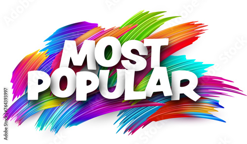 Most popular paper word sign with colorful spectrum paint brush strokes over white.