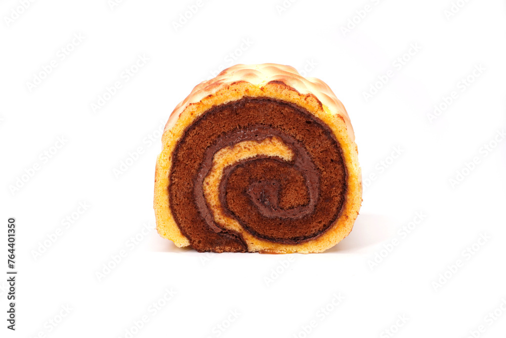Obraz premium Tiger skin swiss roll cake isolated on white background. Bakery product photography