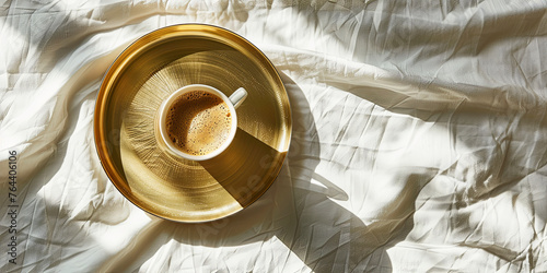 an espresso from a top view, on a golden tray, on a white tablecloth, generative AI