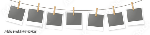 hanging polaroids or photoframes in clothespins