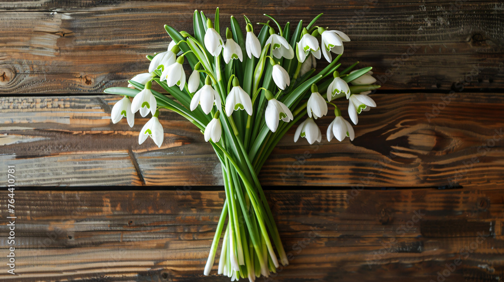 bouquet of snowdrops on wooden background bouquet of snowdrops on wooden background