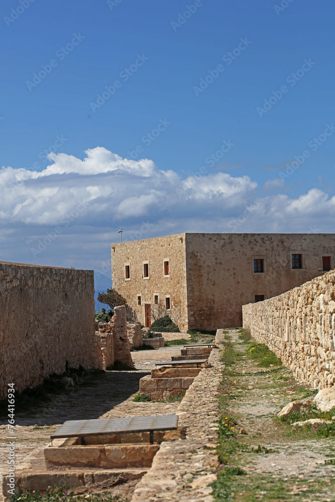 Fortezza fortress castle in Crete island Rethimno holidays exploring the old ancient stone city monuments close up summer background carnival season high quality big size prints