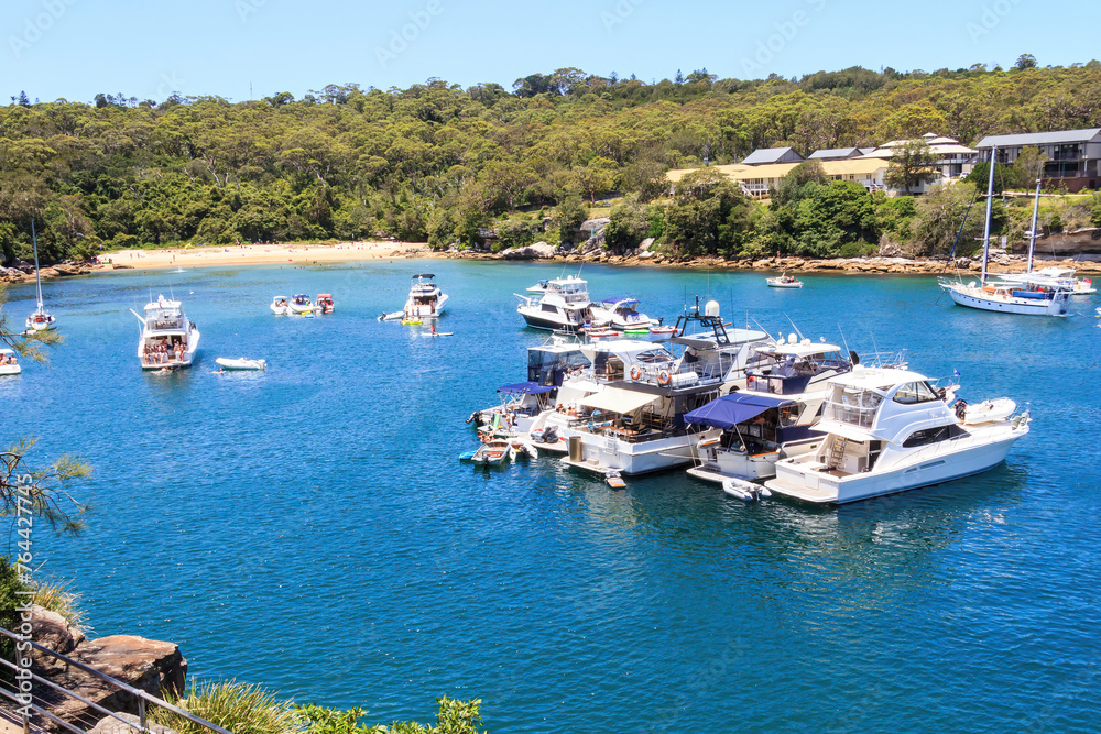 Boats moored in te bay of Collins Flat beach