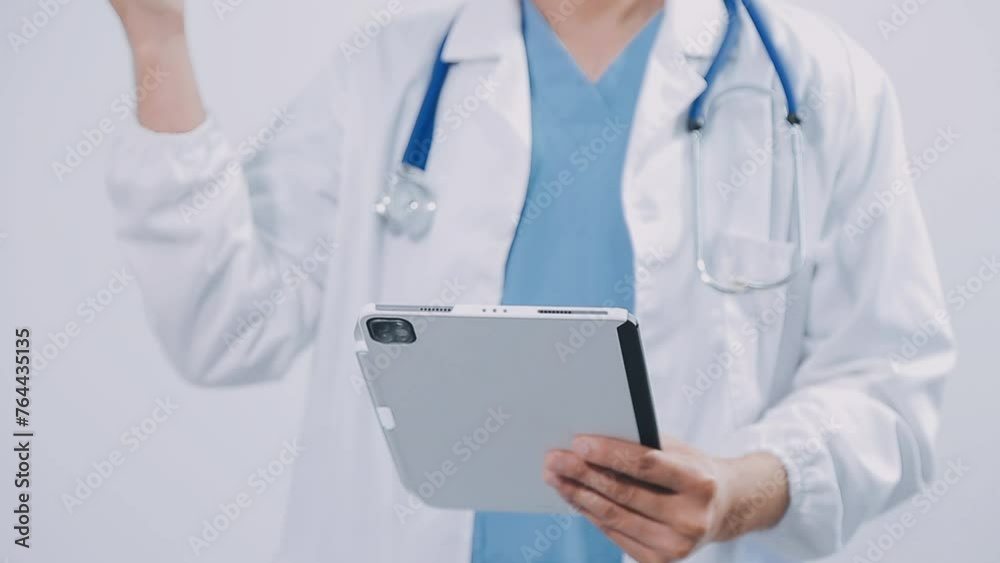 Doctor using digital tablet find information patient medical history at the hospital. Medical technology concept. Doctor using digital tablet find information patient medical history at the hospital. Medical technology concept.