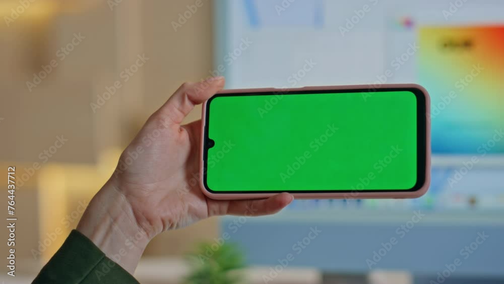 Woman looking content green screen mobile phone at office work break close up. Woman looking content green screen mobile phone at office work break close up.