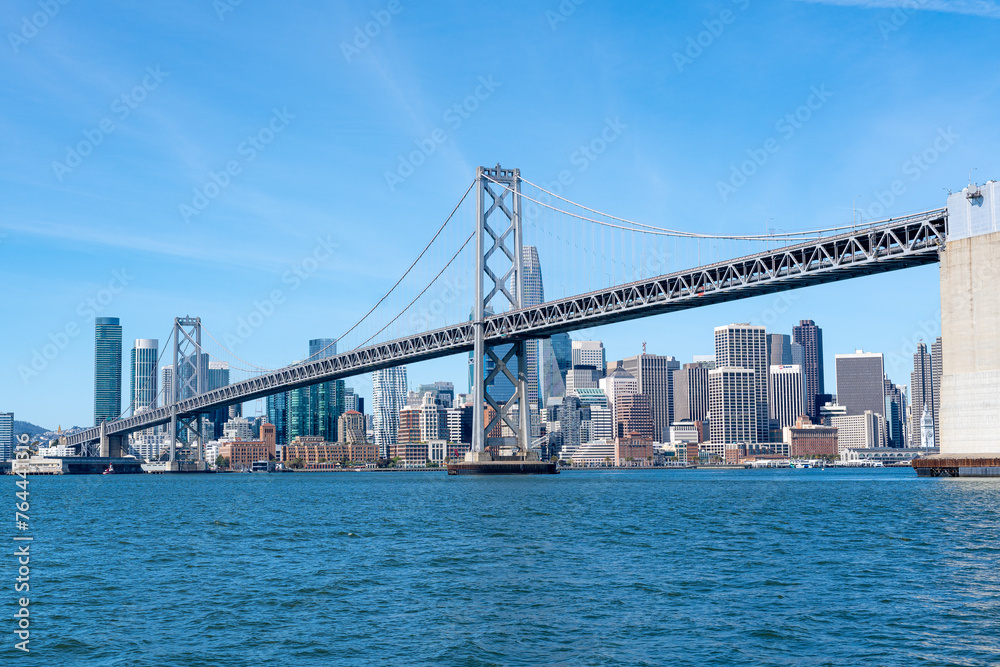 The Oakland Bay Bridge and the downtown San Francisco skyline as viewed from the San Francisco Bay.
