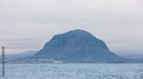 Island scenery seen from the sea on a cloudy day.