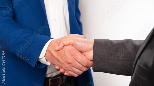 Holding hands with business partners to trust business partners, relationships to achieve future commercial and investment goals. 