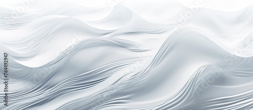 A detailed view of a white backdrop featuring a flowing and undulating design