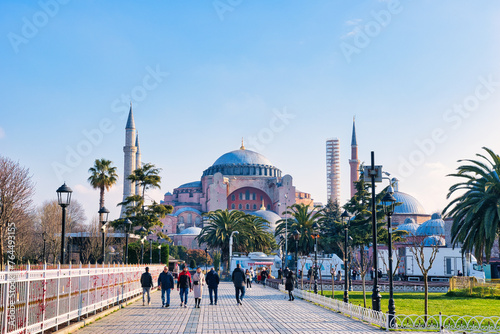 Istanbul, Turkey - March 21, 2024: Editorial: Hagia Sophia mosque in the morning against blue sky in spring in Istanbul, Turkey photo