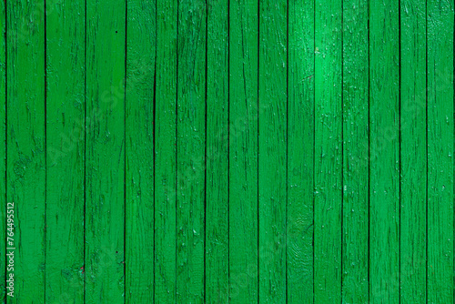 green paint wooden planks fence texture.