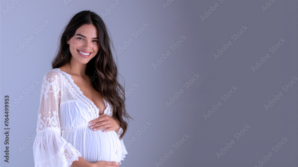 Hispanic pregnant woman with pregnancy belly, in soft white clothes Hispanic pregnant woman with pregnancy belly, in soft white clothes