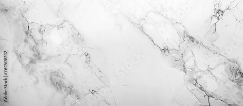 A man riding a surfboard on a stark black and white marble wallpaper background