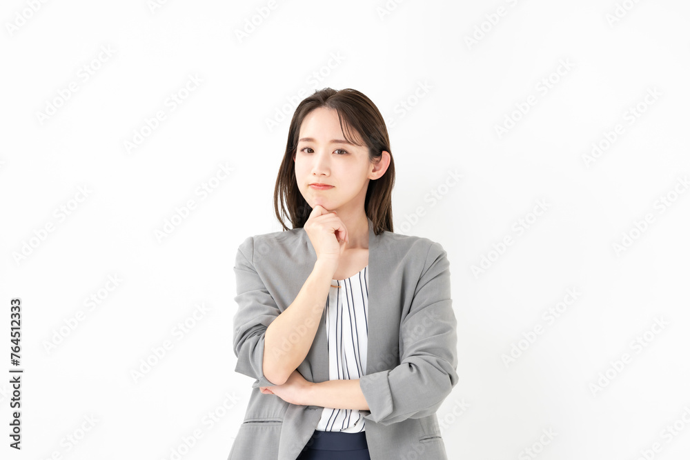 悩む女性・白バック 悩む女性・白バック