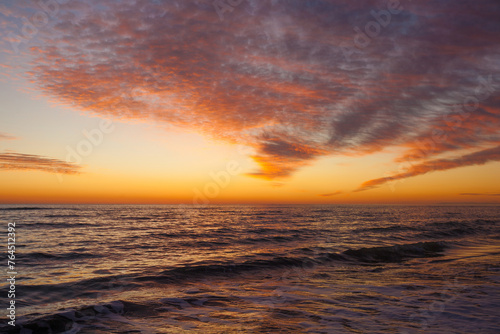 sunset on the sea beautiful waves © Nina