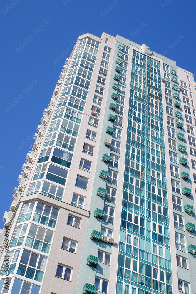 High-rise building against the background of windows, architecture of new buildings.