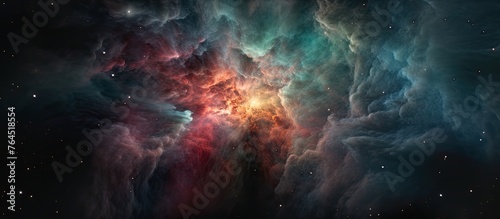 A vibrant and multicolored nebula filled with stars set against a deep and dark cosmic background © 2rogan